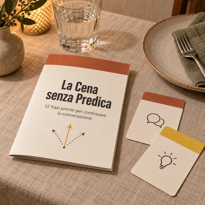 La guida «La Cena senza Predica» accanto al piatto